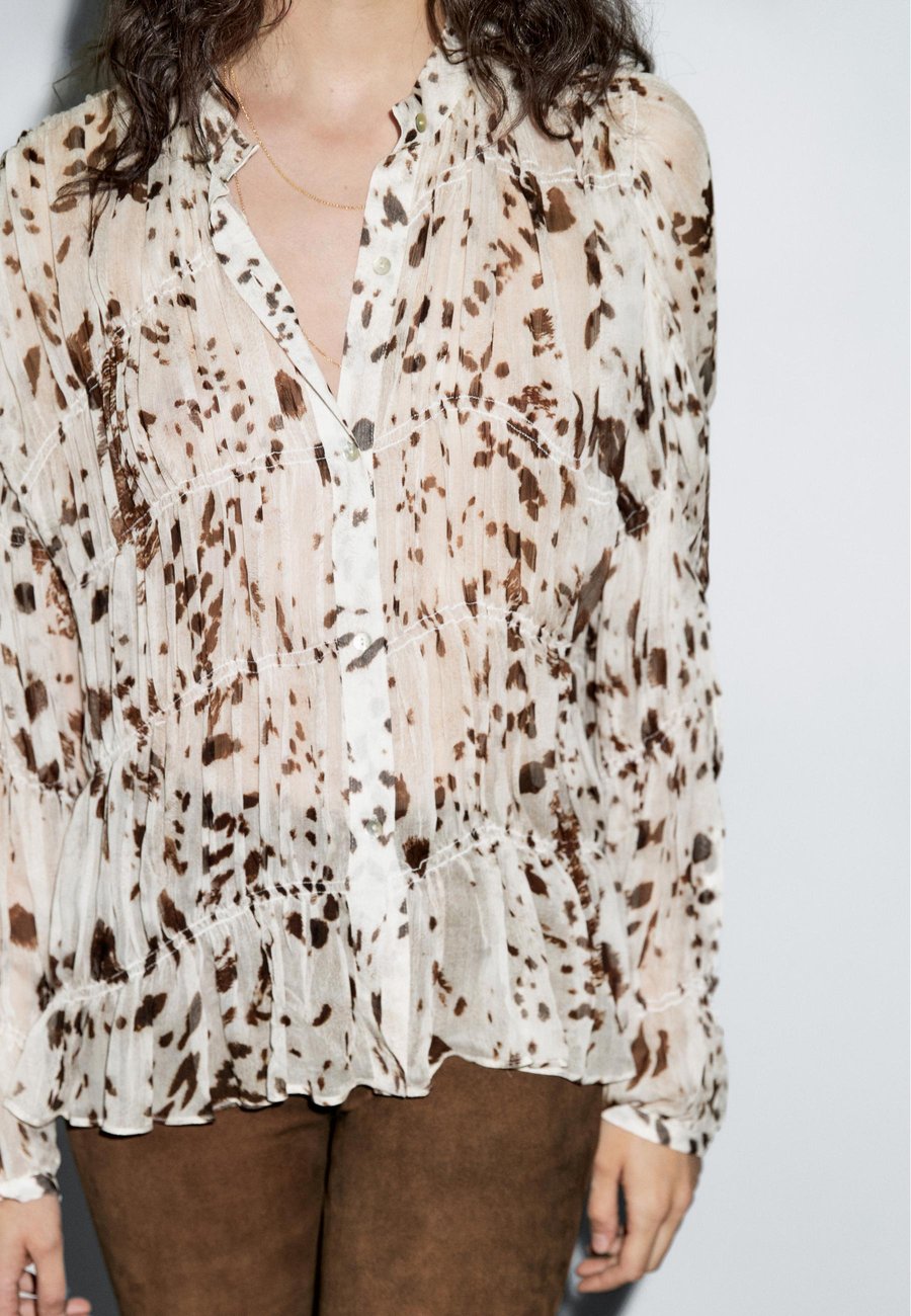 Блуза Massimo Dutti ANIMAL PRINT GARMENT WITH GATHERED DETAIL, Beige
Блуза Massimo Dutti ANIMAL PRINT GARMENT WITH GATHERED DETAIL, Beige