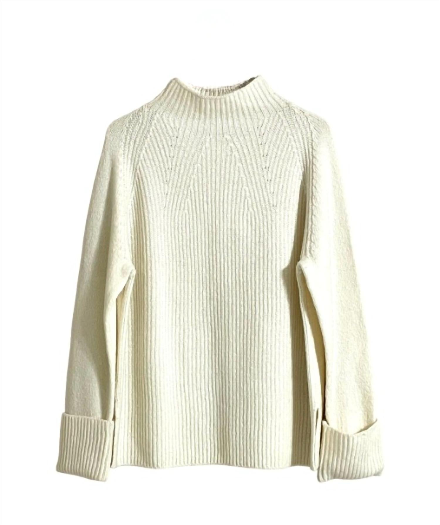 Женский свитер с воронкообразным воротником, длинными рукавами и подвернутыми манжетами в цвете айвори Vince, слоновая кость
Женский свитер с воронкообразным воротником, длинными рукавами и подвернутыми манжетами в цвете айвори Vince, слоновая кость