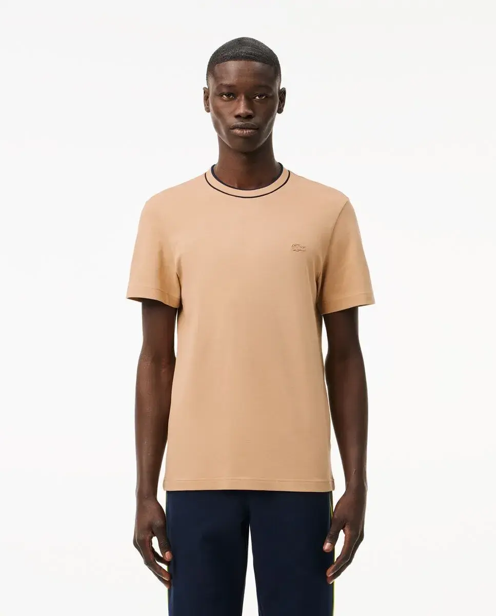 Мужская футболка с коротким рукавом из эластичного пике в полоску Lacoste, бежевый
Мужская футболка с коротким рукавом из эластичного пике в полоску Lacoste, бежевый