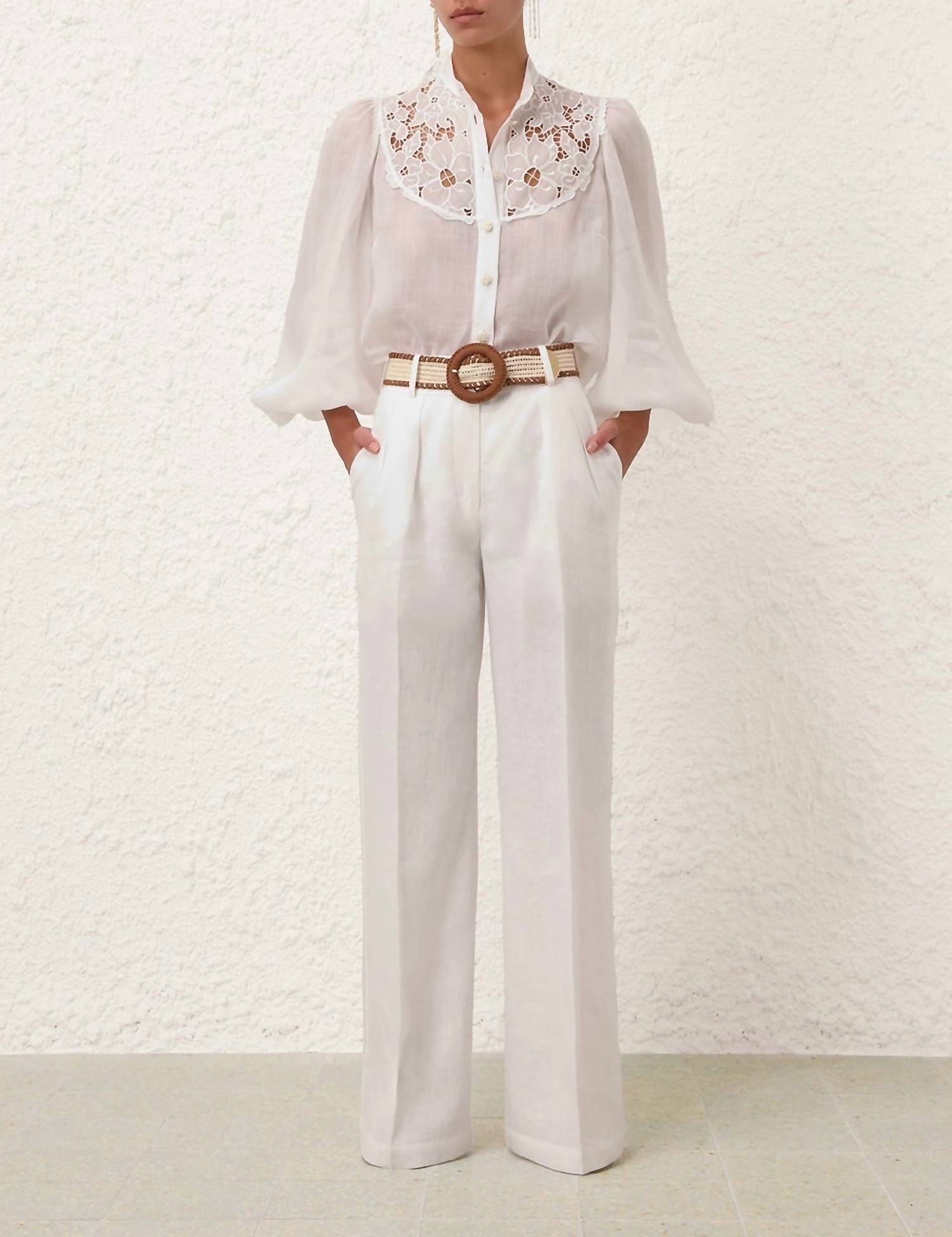 Золотистые брюки с высокой талией в цвете слоновой кости Zimmermann
Золотистые брюки с высокой талией в цвете слоновой кости Zimmermann