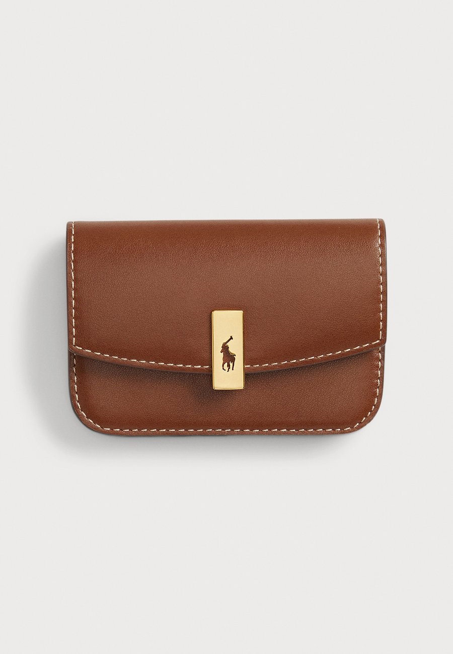 Кошелек Polo Ralph Lauren POLO ID LEATHER FOLD-OVER CARD CASE, Cuoio/Brown
Кошелек Polo Ralph Lauren POLO ID LEATHER FOLD-OVER CARD CASE, Cuoio/Brown