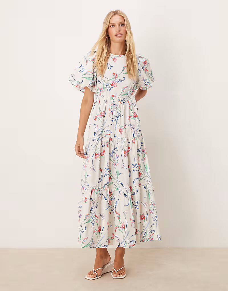 Платье-миди YAS с цветочным принтом и пышными рукавами кремового цвета
Платье-миди YAS с цветочным принтом и пышными рукавами кремового цвета