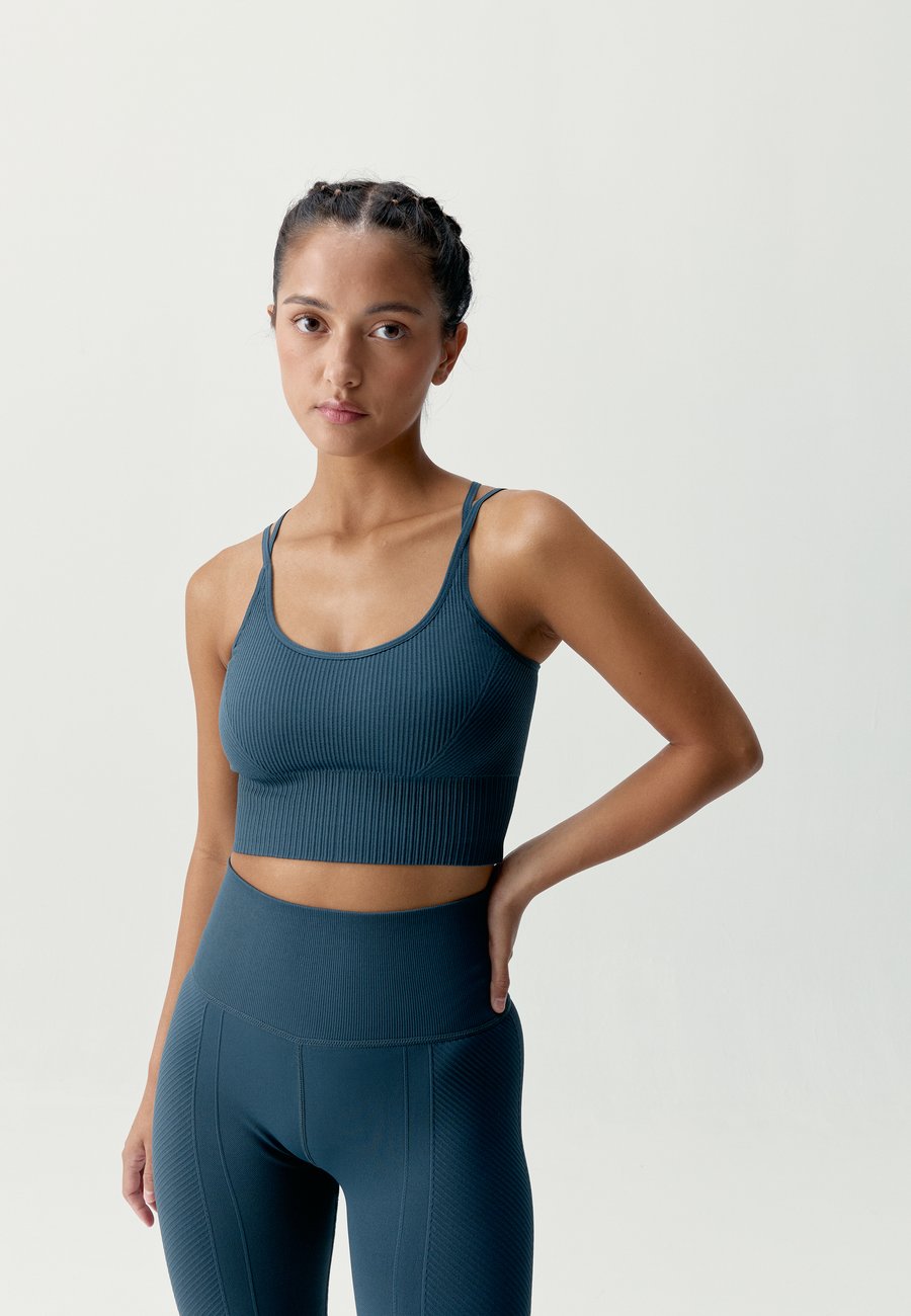 Бюстгальтер Born Living Yoga DEVIKA, Stormy/Blue
Бюстгальтер Born Living Yoga DEVIKA, Stormy/Blue