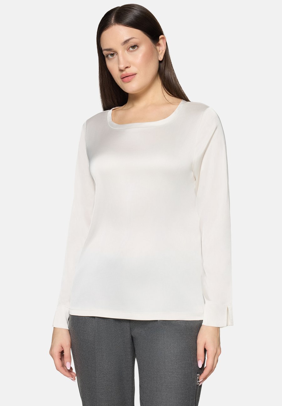 Блуза Betty Barclay SCHLUPF MIT U AUSSCHNITT, Rohweiß/White
Блуза Betty Barclay SCHLUPF MIT U AUSSCHNITT, Rohweiß/White