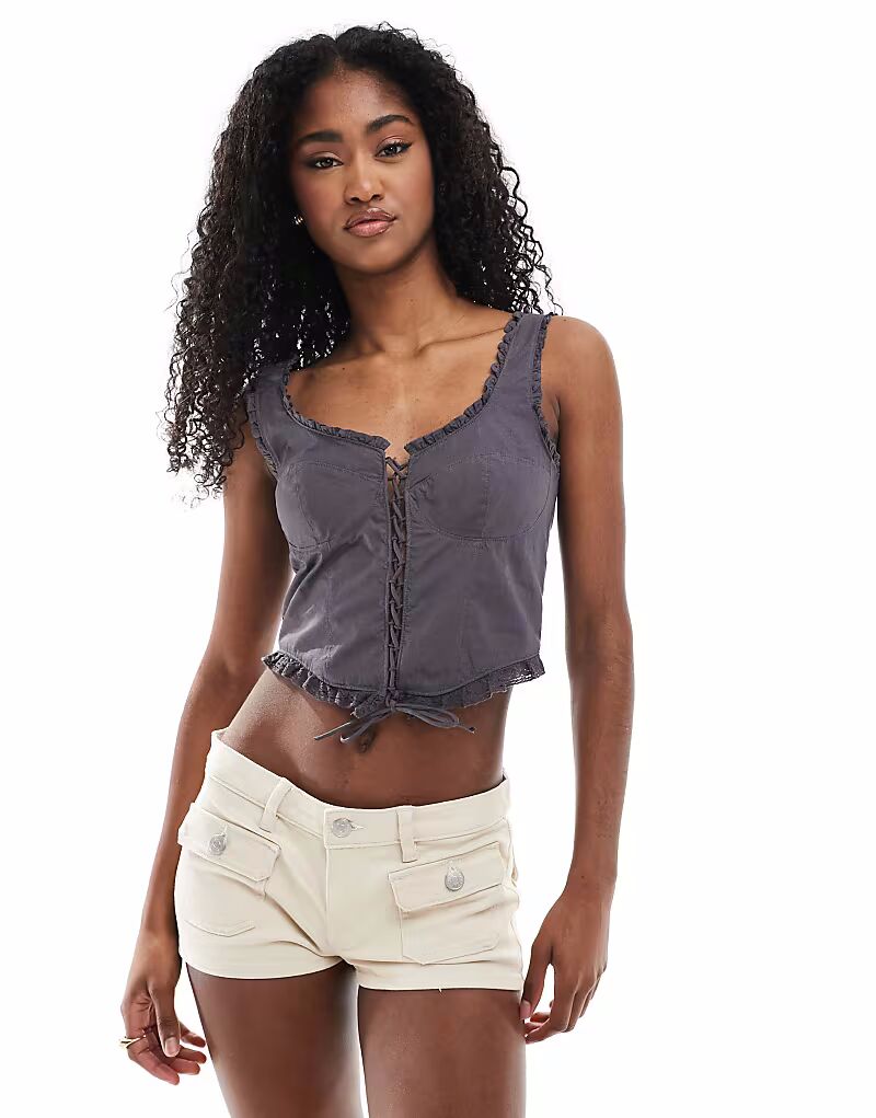 Корсетный топ Monki с оборками по краям и шнуровкой в цвете «грязно-черный»
Корсетный топ Monki с оборками по краям и шнуровкой в цвете «грязно-черный»