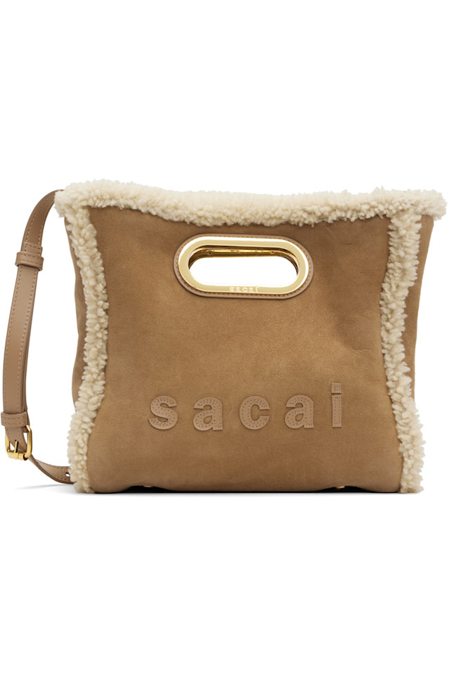 Sacai Небольшая бежевая сумка-шоппер из овчины
Sacai Небольшая бежевая сумка-шоппер из овчины