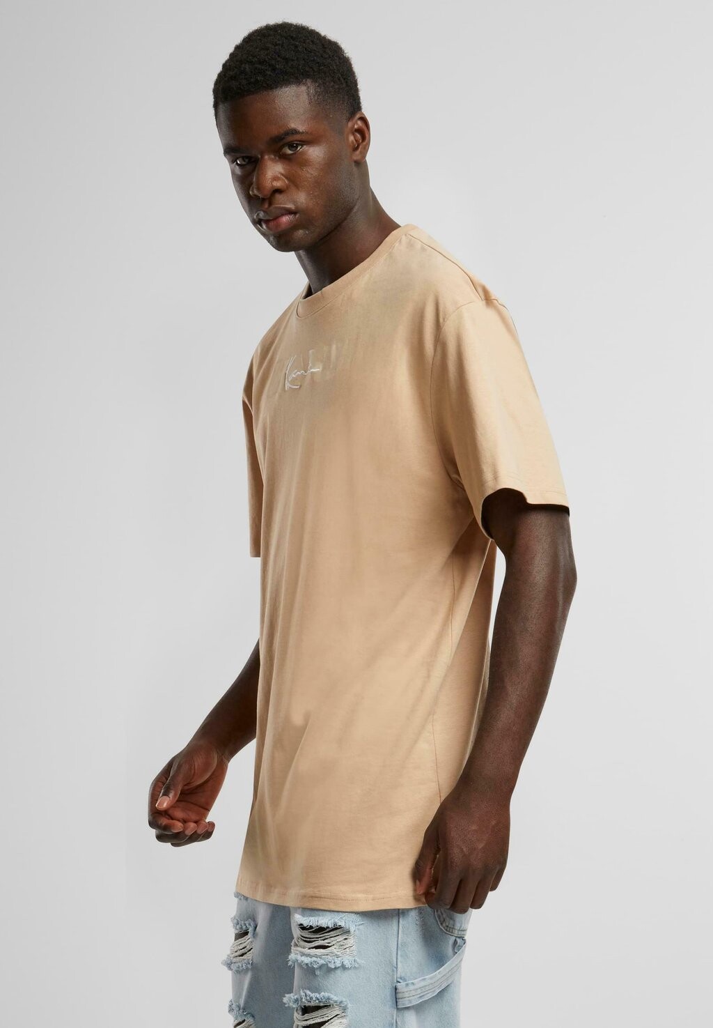 Футболка с принтом Signature Retro Karl Kani, песочный
Футболка с принтом Signature Retro Karl Kani, песочный