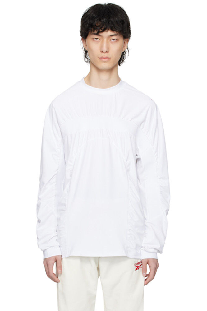 Белая футболка с длинным рукавом Reebok Edition KANGHYUK
Белая футболка с длинным рукавом Reebok Edition KANGHYUK