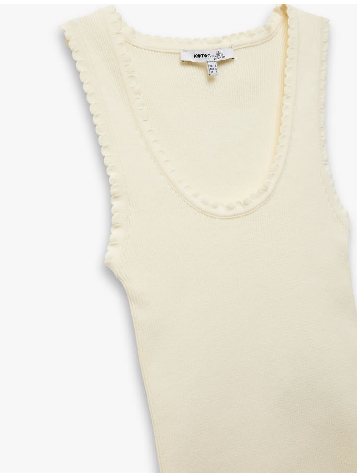 Желтая майка KOTON
Желтая майка KOTON