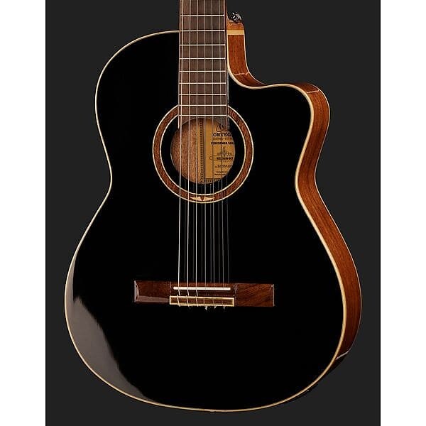 Акустическая гитара Ortega RCE238SN-BKT Performer Series Solid Top Slim Neck Acoustic-Electric Nylon Classical Guitar with Bag 
Акустическая гитара Ortega RCE238SN-BKT Performer Series Solid Top Slim Neck Acoustic-Electric Nylon Classical Guitar with Bag