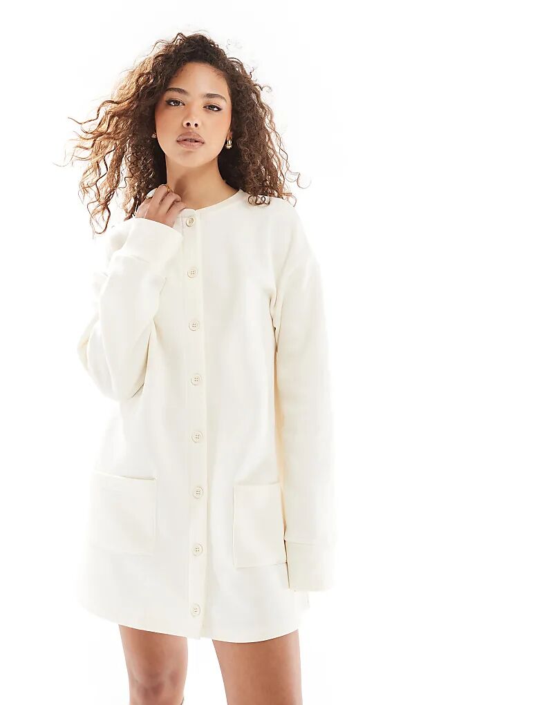 Свободный мини-платье-свитшот с длинными рукавами и застежкой на пуговицы кремового цвета ASOS DESIGN
Свободный мини-платье-свитшот с длинными рукавами и застежкой на пуговицы кремового цвета ASOS DESIGN