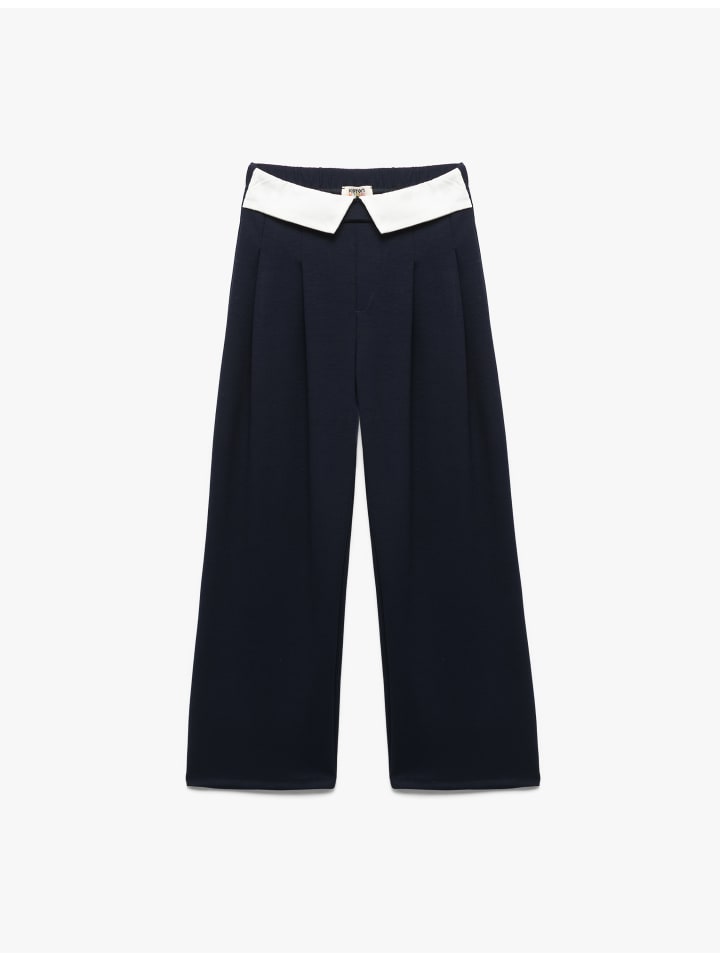 Брюки темно-синего цвета KOTON
Брюки темно-синего цвета KOTON