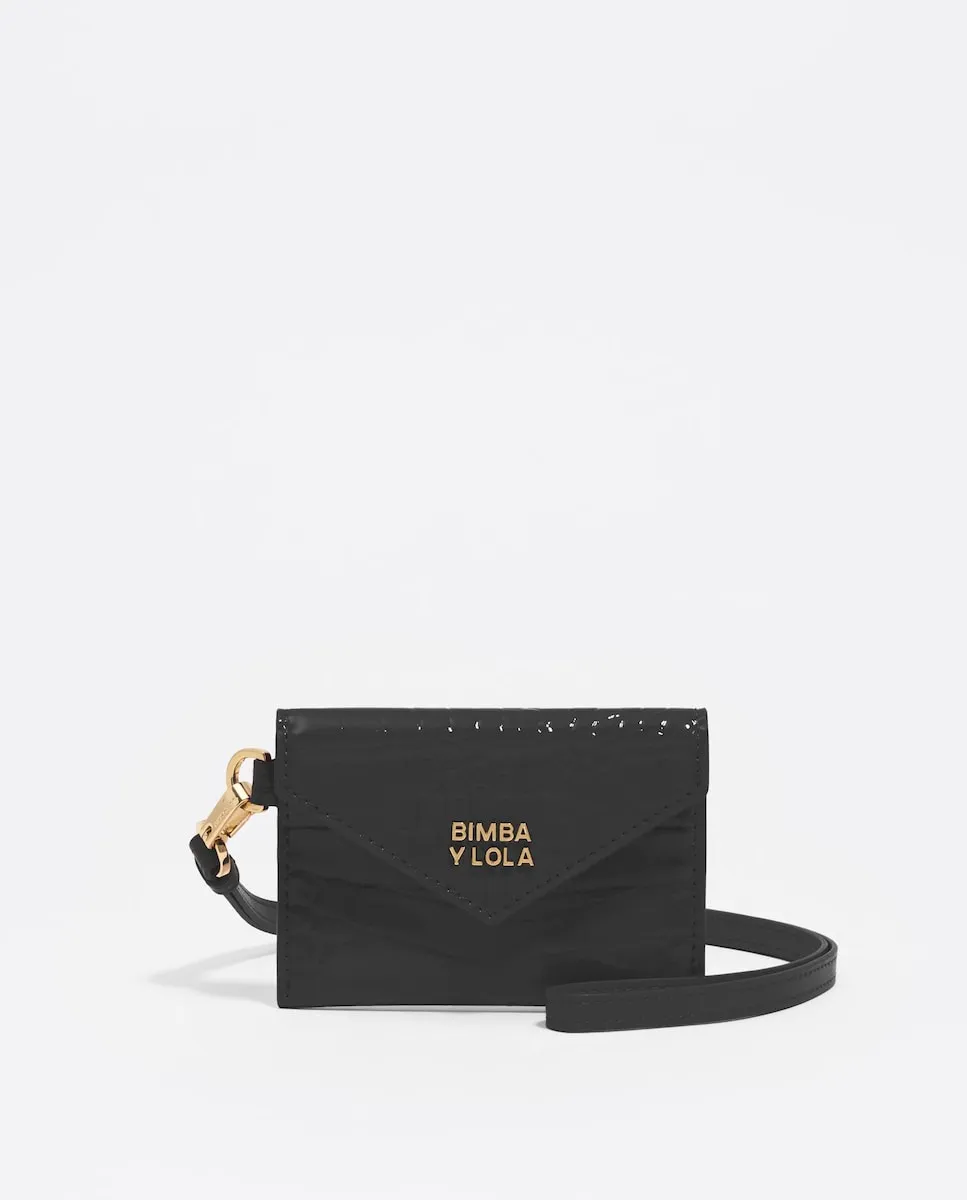 Женский кошелек с блестящей черной текстурой Bimba y Lola
Женский кошелек с блестящей черной текстурой Bimba y Lola