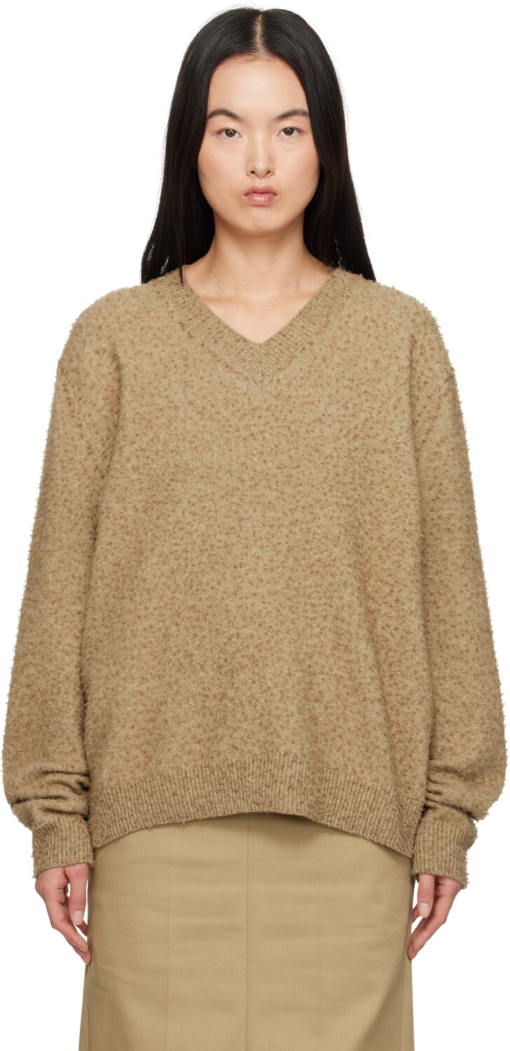 Бежевый свитер с V-образным вырезом и катышками Maison Margiela
Бежевый свитер с V-образным вырезом и катышками Maison Margiela