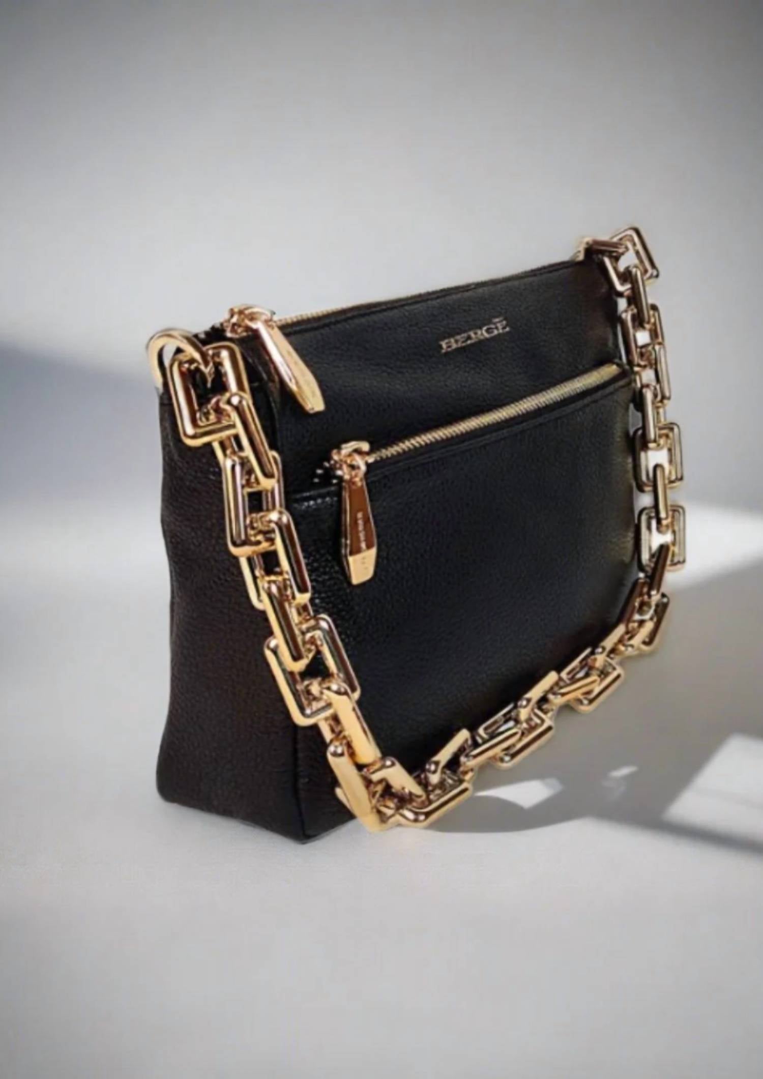 Женская сумка Aria с карманом на молнии в черном цвете Berge
Женская сумка Aria с карманом на молнии в черном цвете Berge