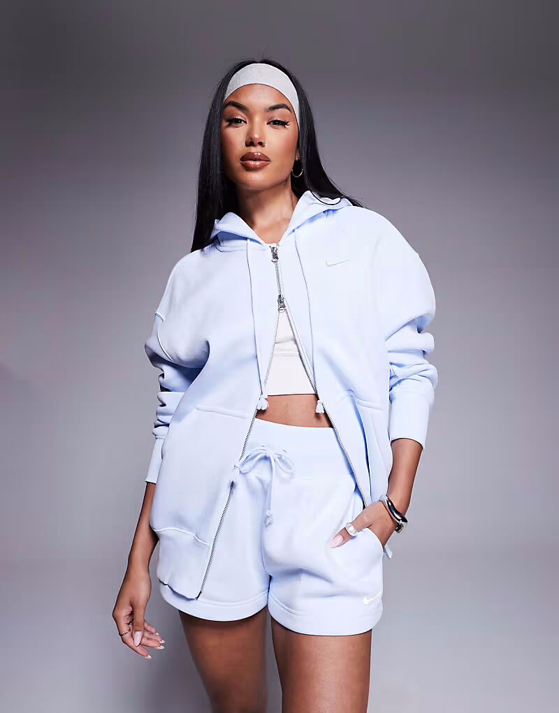 Толстовка свободного кроя с капюшоном Nike Phoenix Fleece светло-голубого цвета с застежкой-молнией по всей длине
Толстовка свободного кроя с капюшоном Nike Phoenix Fleece светло-голубого цвета с застежкой-молнией по всей длине