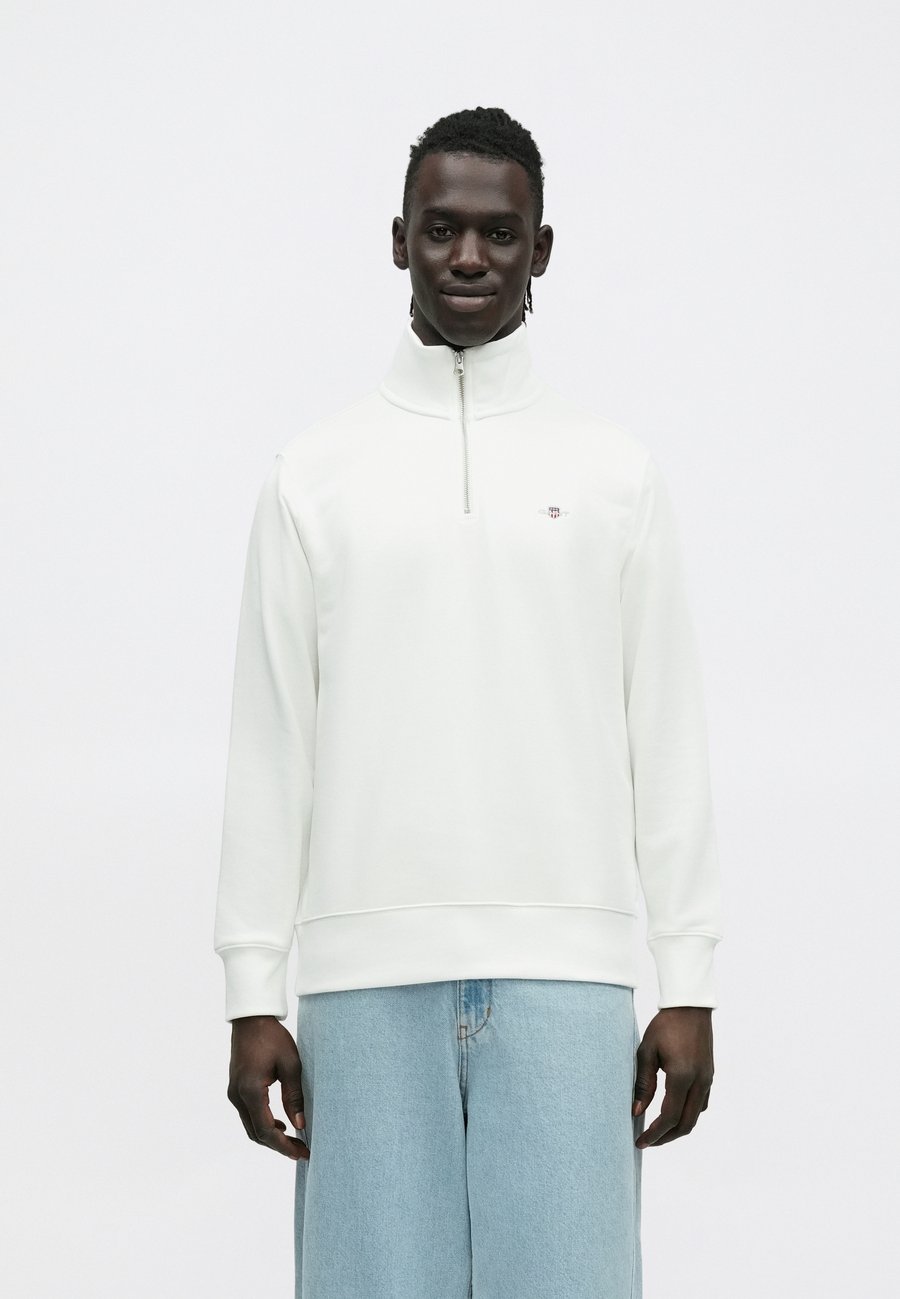 Толстовка GANT SHIELD HALF ZIP , Eggshell/Off-White
Толстовка GANT SHIELD HALF ZIP , Eggshell/Off-White