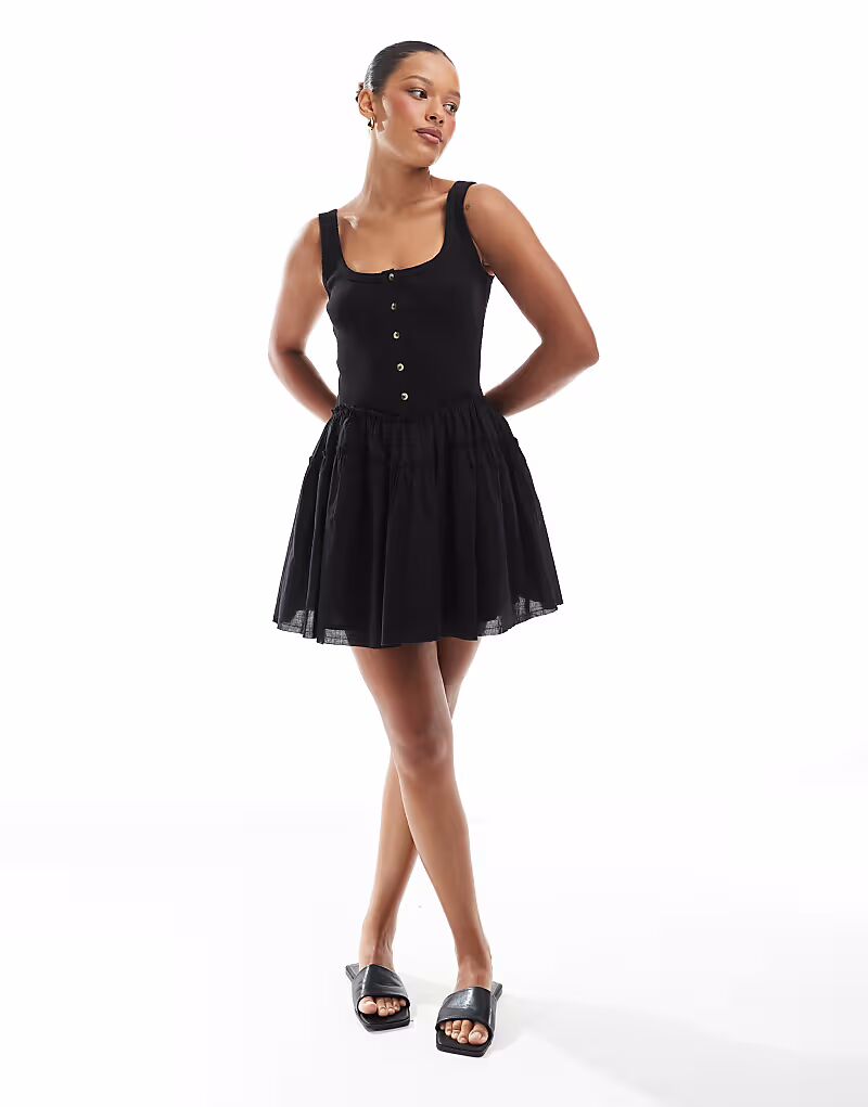 Платье ASOS Design scoop button ribbed bodice with poplin skirt mini in black 
Платье ASOS Design scoop button ribbed bodice with poplin skirt mini in black