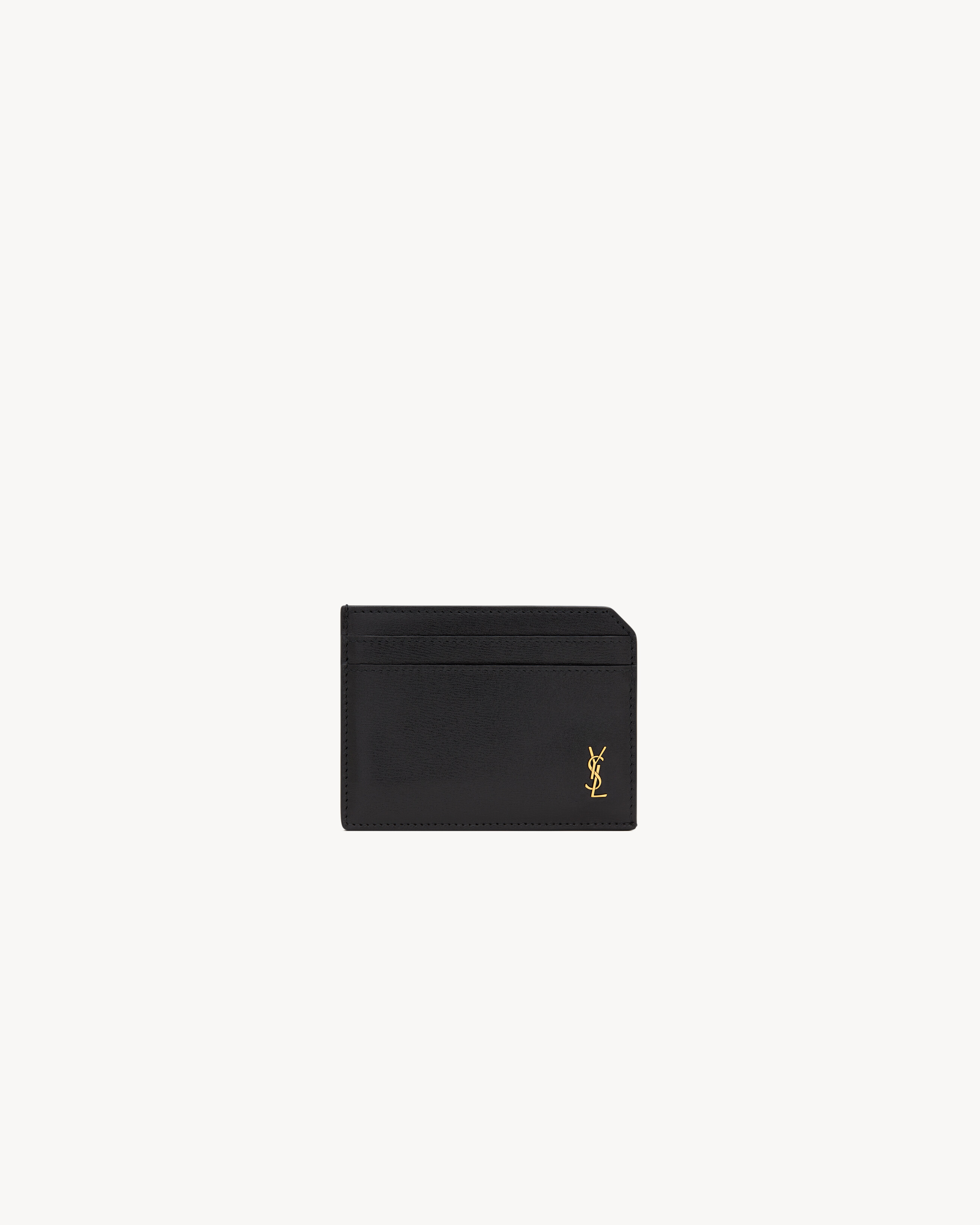 Открытый кардхолдер TINY CASSANDRE из блестящей кожи Saint Laurent, черный
Открытый кардхолдер TINY CASSANDRE из блестящей кожи Saint Laurent, черный