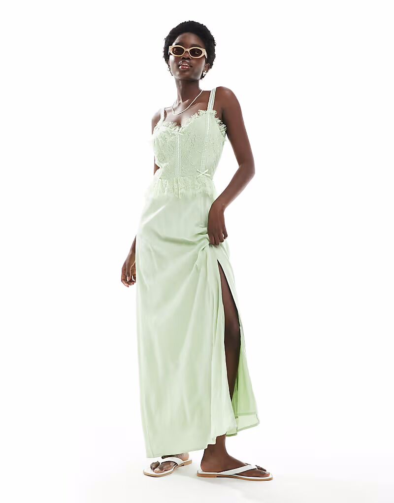 Платье-корсет макси от Miss Selfridge из марли с отделкой лентами зеленого цвета
Платье-корсет макси от Miss Selfridge из марли с отделкой лентами зеленого цвета