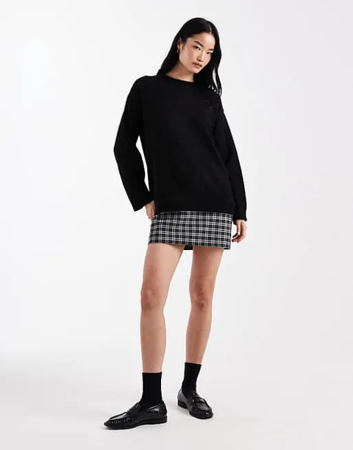Черное вязаное платье-джемпер ASOS DESIGN
Черное вязаное платье-джемпер ASOS DESIGN