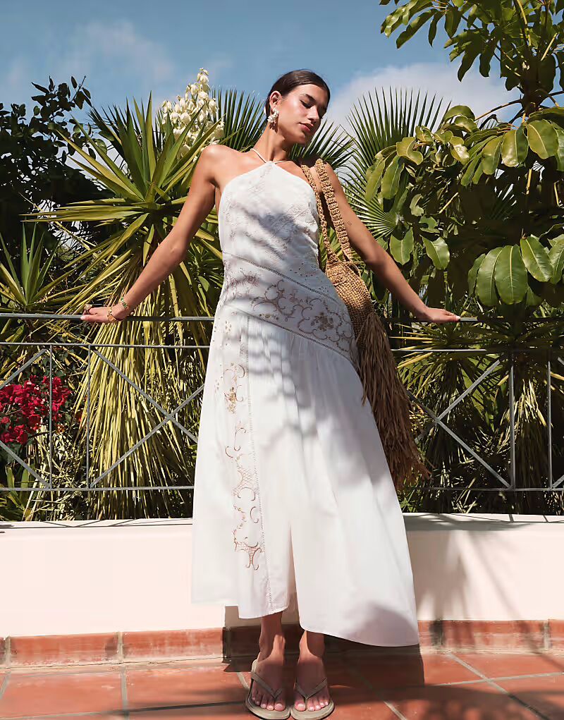 Платье макси ASOS DESIGN с бретелью через шею в тон с асимметричной вставкой цвета слоновой кости
Платье макси ASOS DESIGN с бретелью через шею в тон с асимметричной вставкой цвета слоновой кости