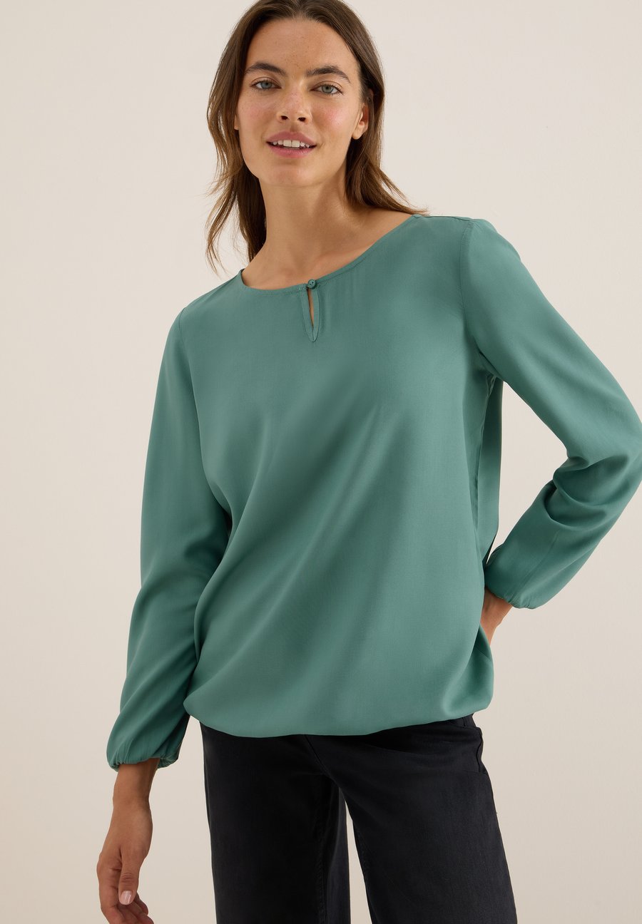 Блуза Cecil Blouse, Grün/Green
Блуза Cecil Blouse, Grün/Green
