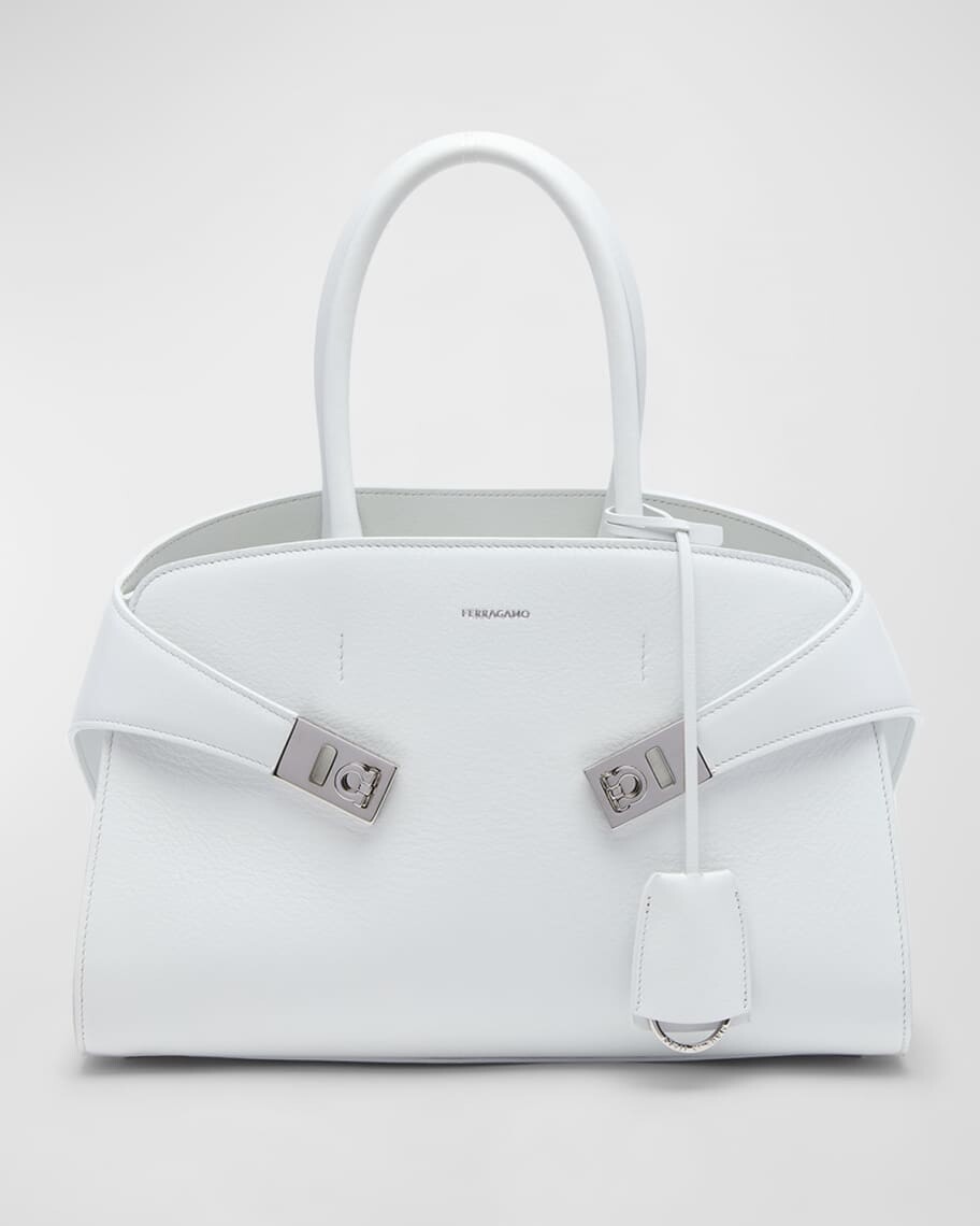 Кожаная сумка Hug Gancini с ручкой сверху Ferragamo
Кожаная сумка Hug Gancini с ручкой сверху Ferragamo
