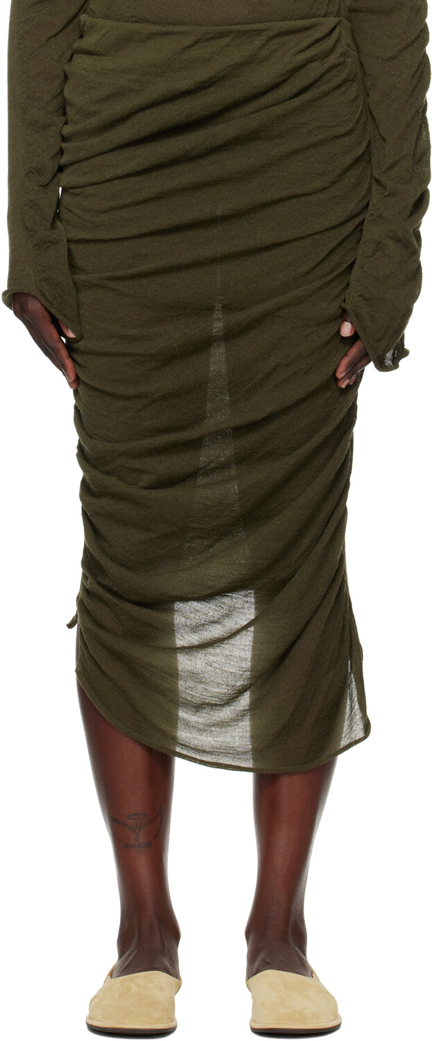 Зеленая неоднозначная шерстяная юбка-миди ISSEY MIYAKE
Зеленая неоднозначная шерстяная юбка-миди ISSEY MIYAKE