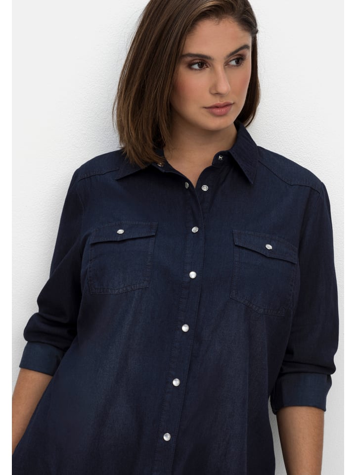 Джинсовая блузка из темно-синего денима sheego
Джинсовая блузка из темно-синего денима sheego