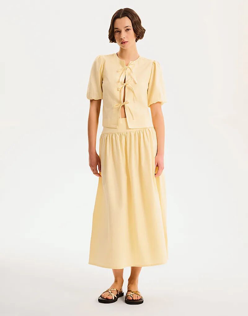 Юбка миди из хлопка Omnes Skirts Darcie желтого цвета
Юбка миди из хлопка Omnes Skirts Darcie желтого цвета