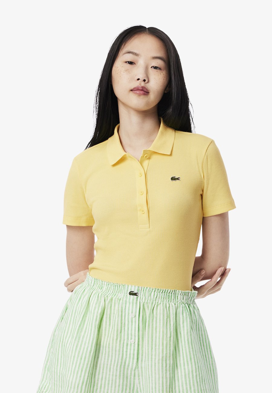 Поло Lacoste DF5377_70V, Jaune Pastel-107/Beige
Поло Lacoste DF5377_70V, Jaune Pastel-107/Beige