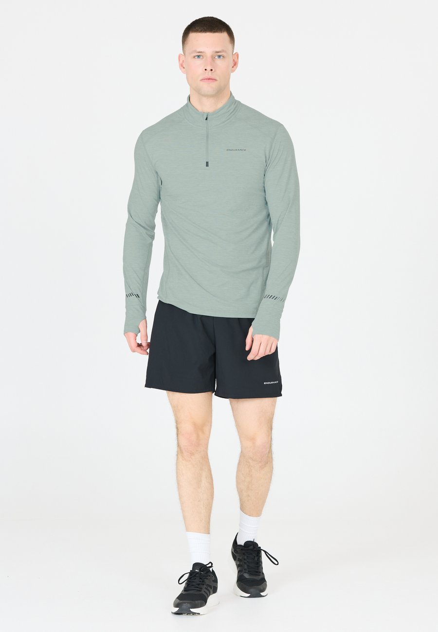 Топ Endurance MIDLAYER TUNE, Misty Blue/Mint
Топ Endurance MIDLAYER TUNE, Misty Blue/Mint