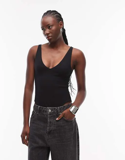 Компактное хлопковое боди черного цвета с v-образным вырезом ASOS DESIGN
Компактное хлопковое боди черного цвета с v-образным вырезом ASOS DESIGN