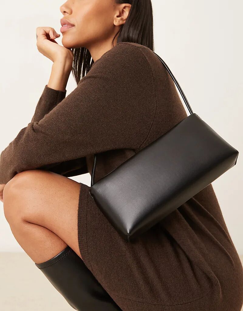 Минималистичная сумка через плечо ASOS DESIGN в стиле 90-х черного цвета
Минималистичная сумка через плечо ASOS DESIGN в стиле 90-х черного цвета