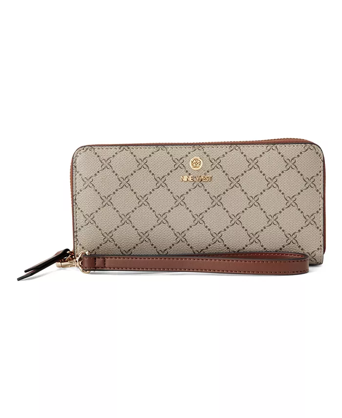 Кошелек Lockup 9S на молнии Nine West, коричневый
Кошелек Lockup 9S на молнии Nine West, коричневый