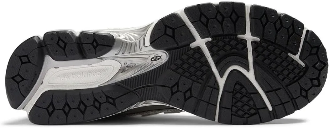 Кроссовки New Balance 1906 для мужчин, металлик/черный/серебристый
Кроссовки New Balance 1906 для мужчин, металлик/черный/серебристый