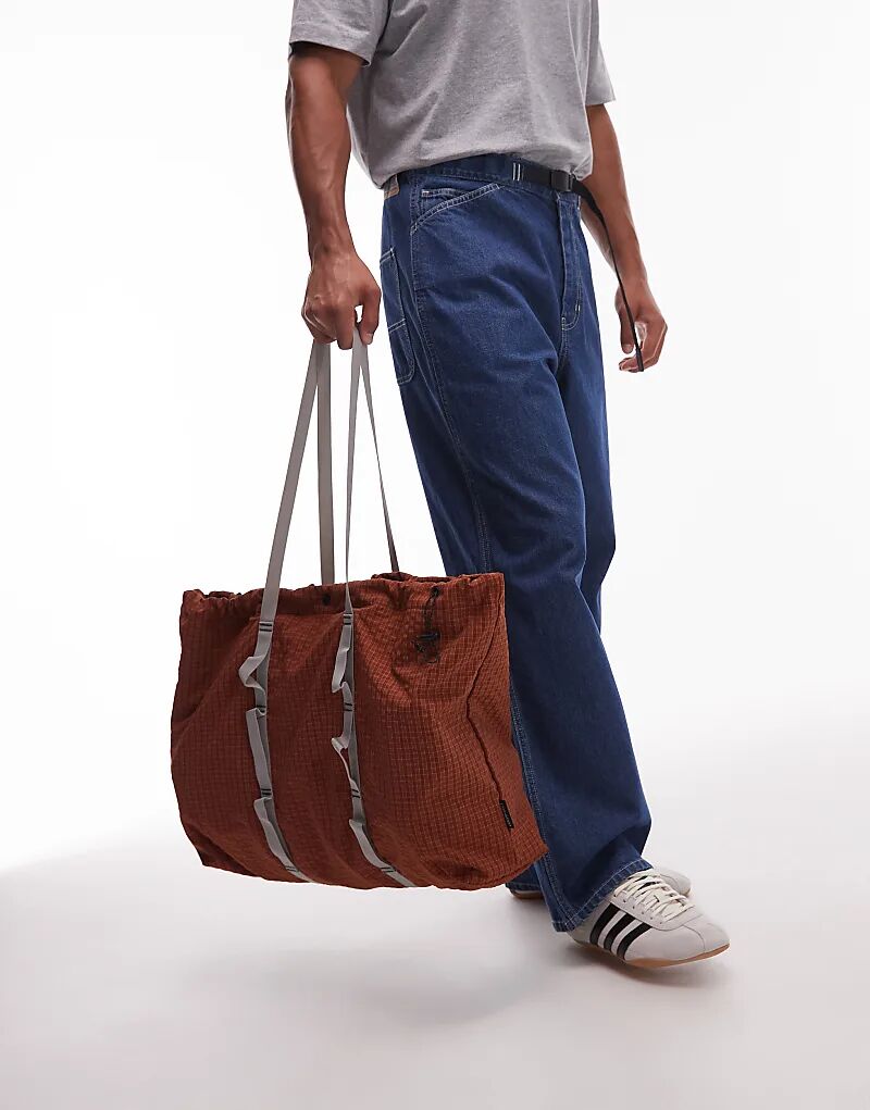 Сумка-тоут Gramicci в клетку цвета выжженного оранжевого цвета
Сумка-тоут Gramicci в клетку цвета выжженного оранжевого цвета