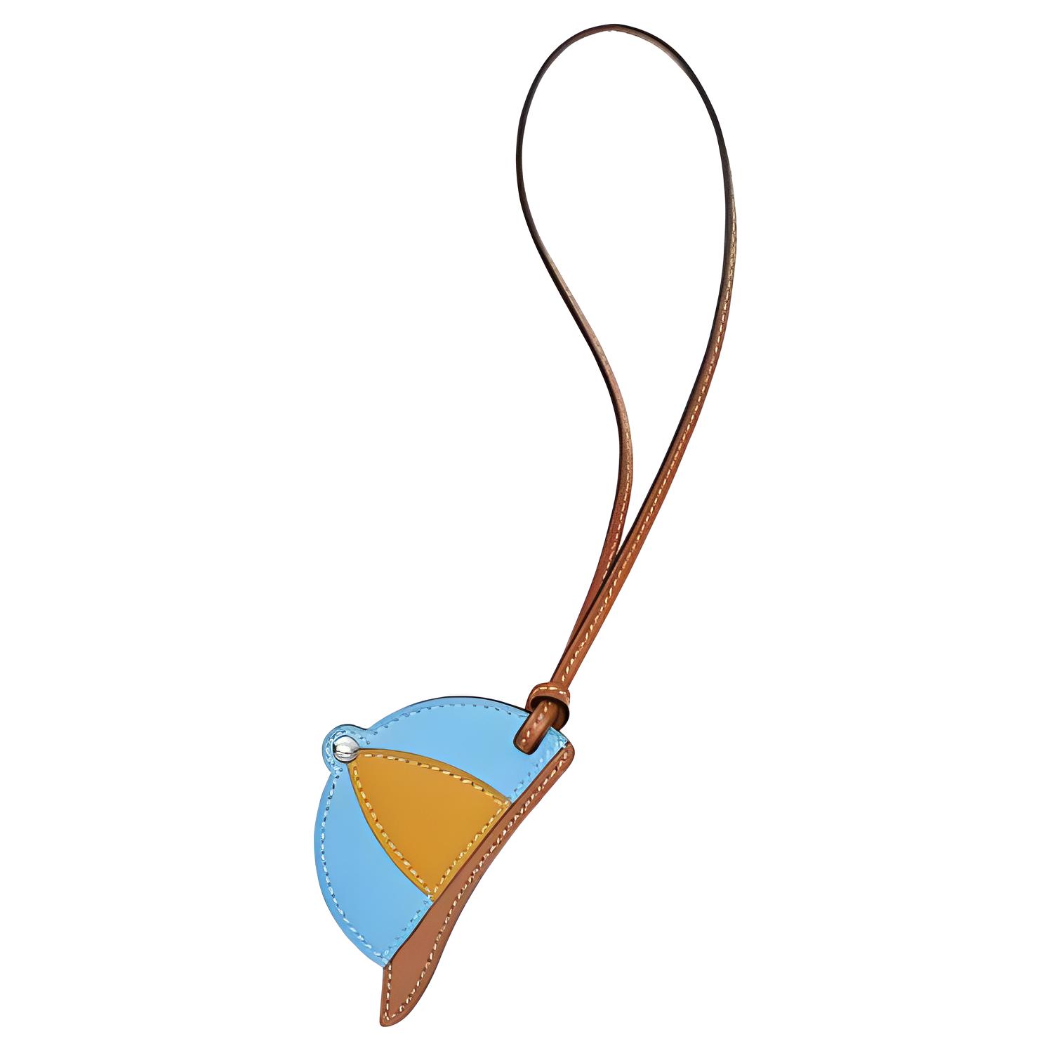 HERMES Брелок для сумки из телячьей кожи, Blue & Yellow
HERMES Брелок для сумки из телячьей кожи, Blue & Yellow