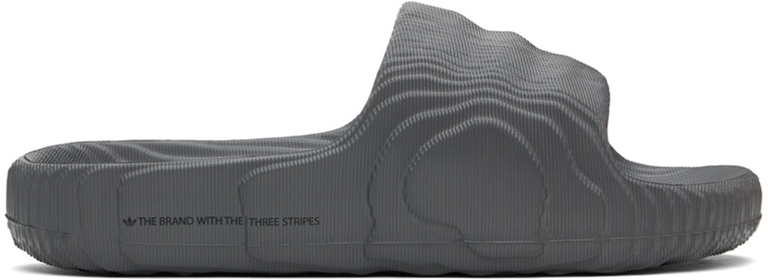 Серые шлепанцы для бассейна Adilette 22 Adidas Originals, Grey five/Grey five/Core black
Серые шлепанцы для бассейна Adilette 22 Adidas Originals, Grey five/Grey five/Core black