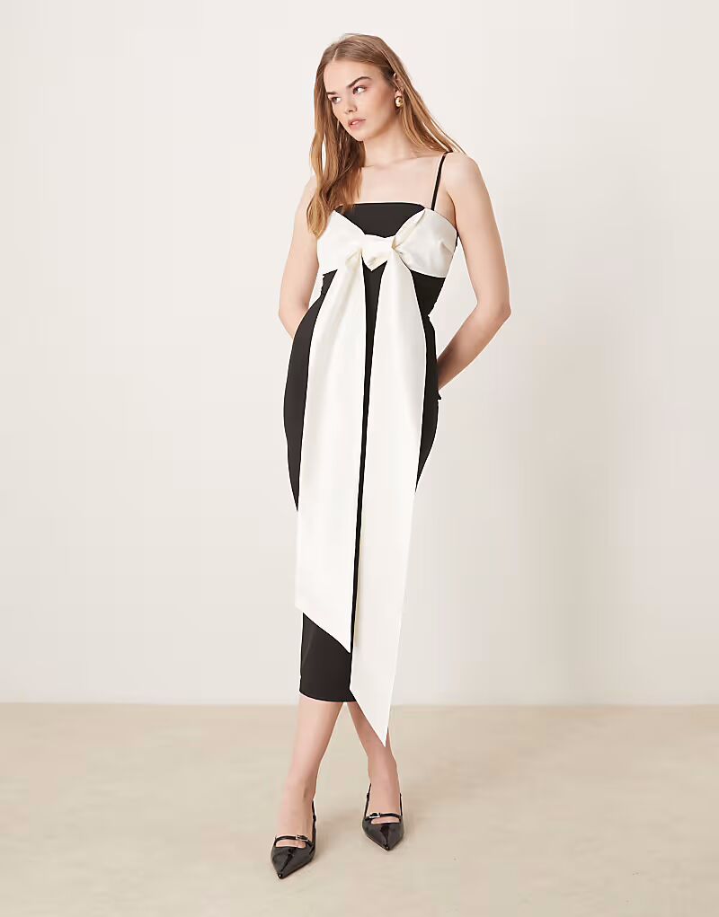 Платье мидакси Pretty Lavish с контрастным бантом в черном и кремовом цветах
Платье мидакси Pretty Lavish с контрастным бантом в черном и кремовом цветах