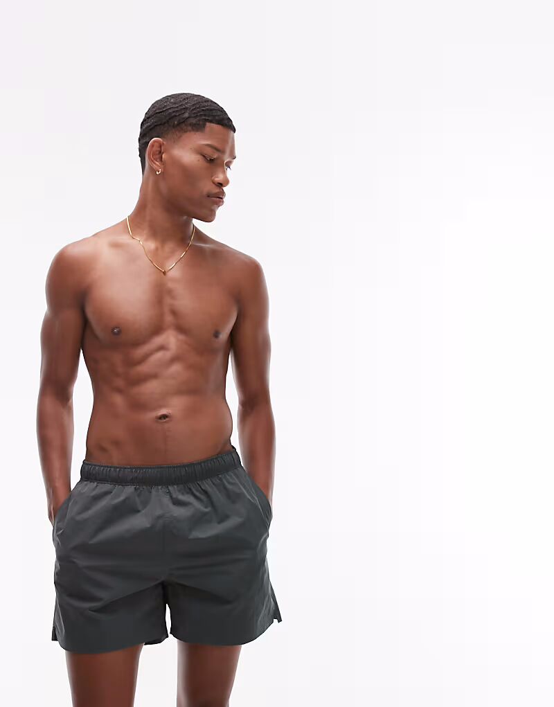 Плавки ARKET темно-зеленого цвета
Плавки ARKET темно-зеленого цвета