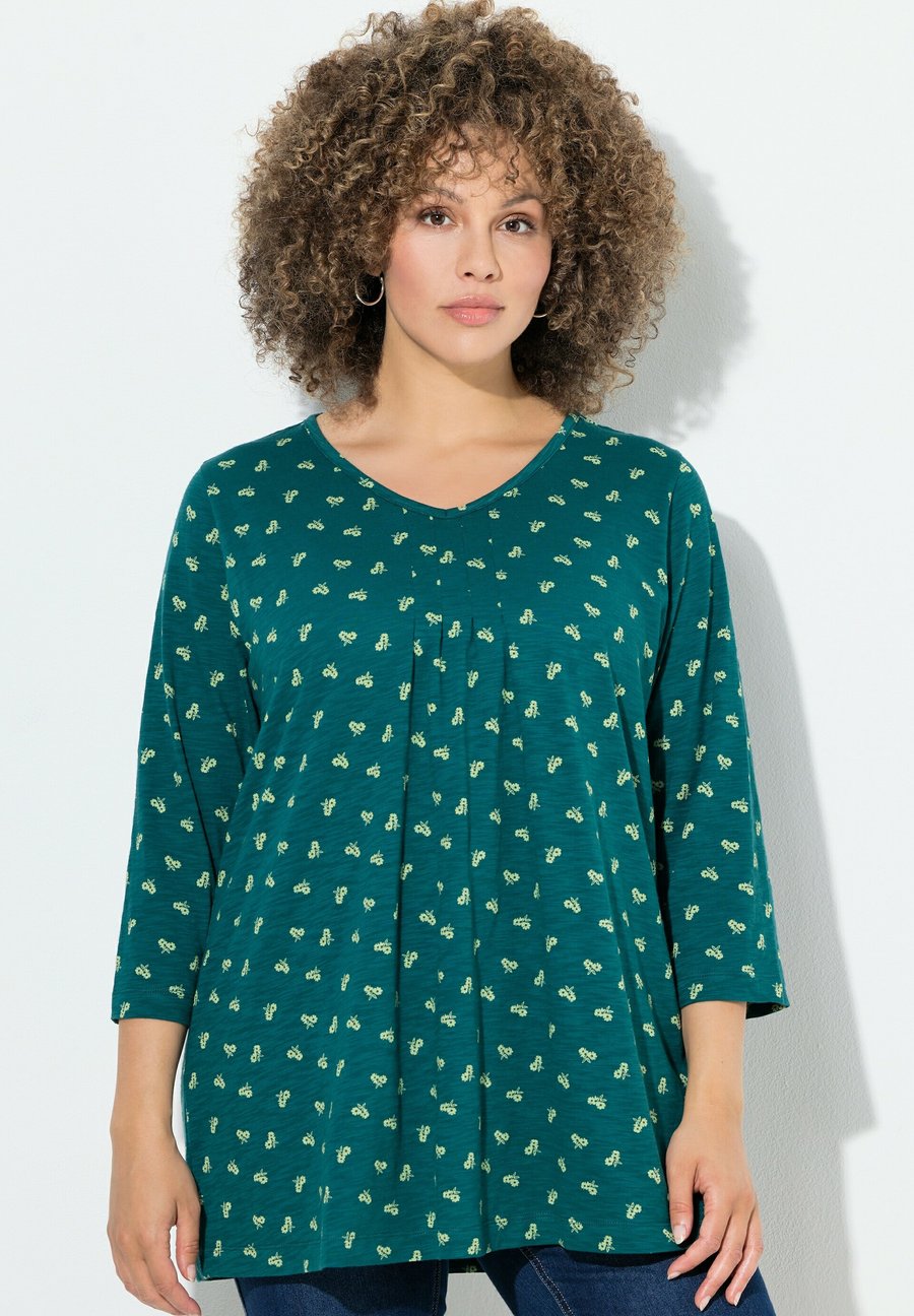 Топ Ulla Popken BLÜTEN, V-AUSSCHNITT, 3/4-ARM, Petrol Green/Teal
Топ Ulla Popken BLÜTEN, V-AUSSCHNITT, 3/4-ARM, Petrol Green/Teal