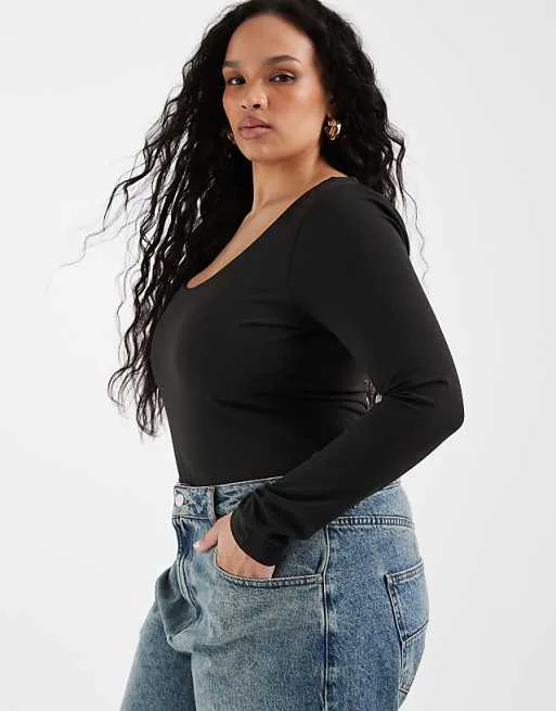 Черное боди с круглым вырезом и длинными рукавами ASOS DESIGN Curve
Черное боди с круглым вырезом и длинными рукавами ASOS DESIGN Curve