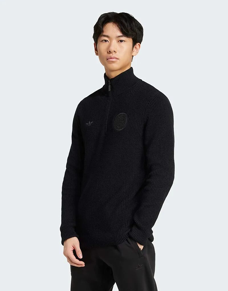 Юбилейная трикотажная толстовка с полумолнией adidas Originals Germany черного цвета
Юбилейная трикотажная толстовка с полумолнией adidas Originals Germany черного цвета