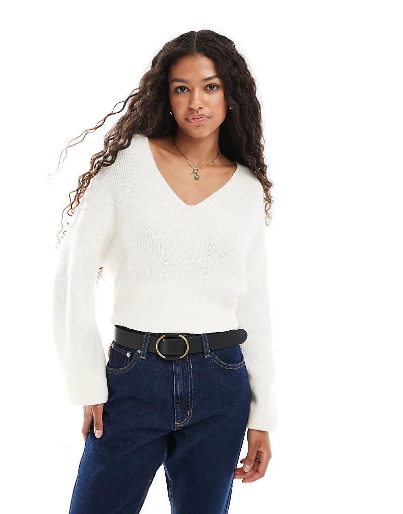 Потертый пушистый свитер с V-образным вырезом, свободного кроя, кремового цвета
Потертый пушистый свитер с V-образным вырезом, свободного кроя, кремового цвета