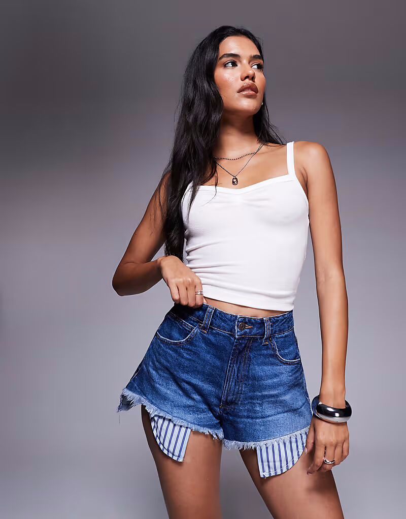 Джинсовые шорты с рваными краями и карманом-сумкой, цвет темный Asos Design
Джинсовые шорты с рваными краями и карманом-сумкой, цвет темный Asos Design