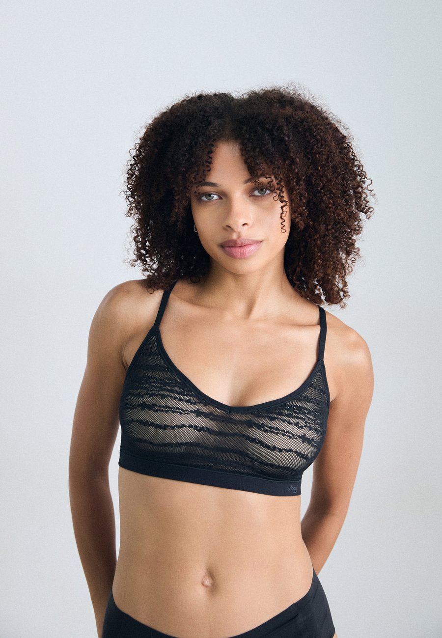 Бюстгальтер Sloggi FREE EVOLVE, Black
Бюстгальтер Sloggi FREE EVOLVE, Black