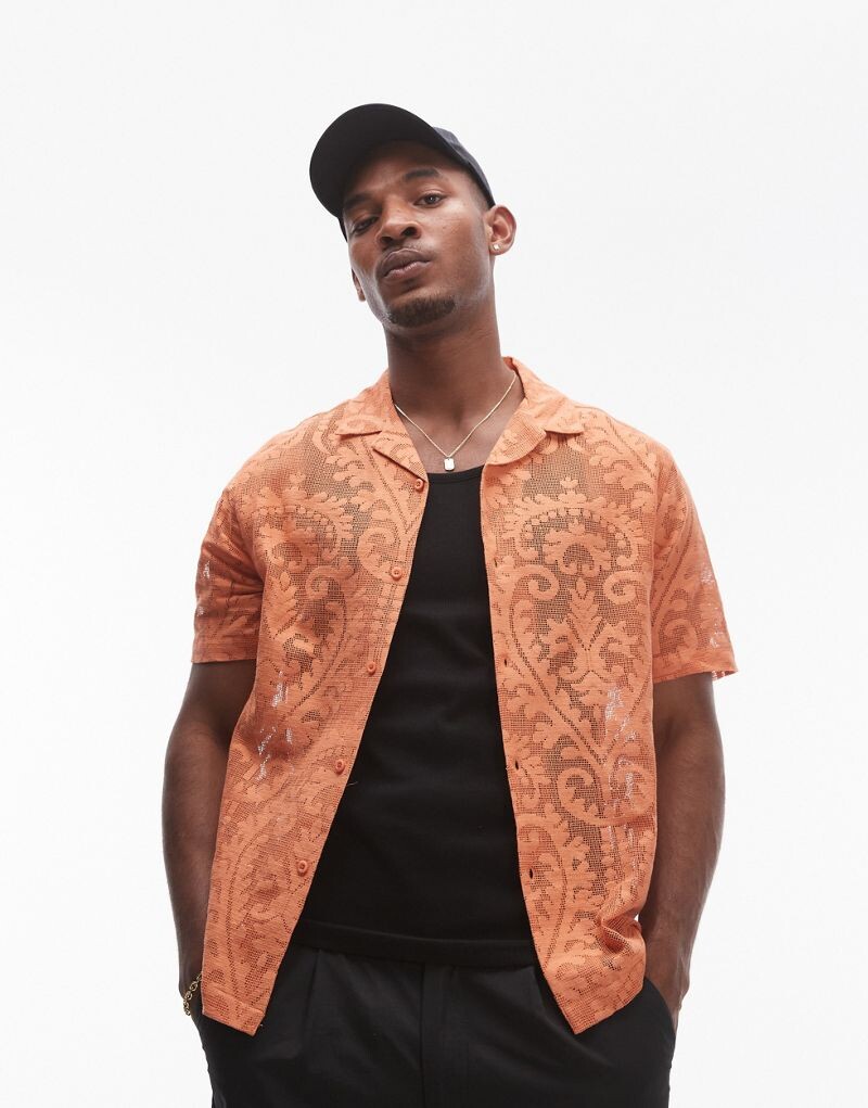 Topman — оранжевая рубашка свободного кроя с короткими рукавами и мотивом деворе
Topman — оранжевая рубашка свободного кроя с короткими рукавами и мотивом деворе
