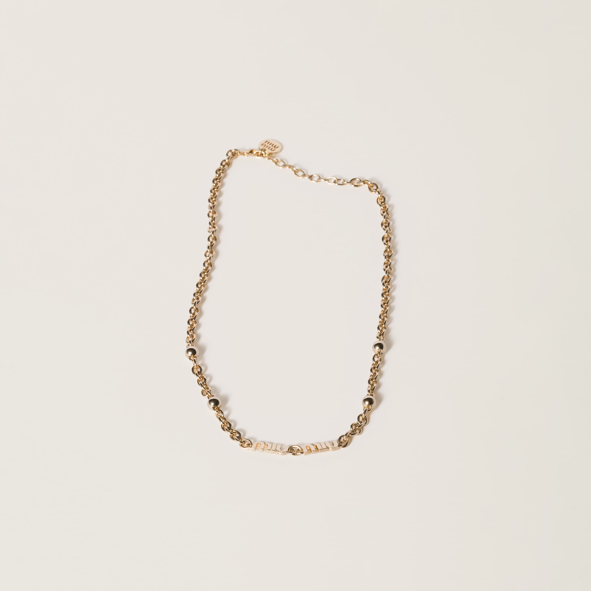 Ожерелье с логотипом MIU MIU, золото
Ожерелье с логотипом MIU MIU, золото